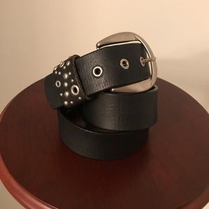 Studded grommet leather belt